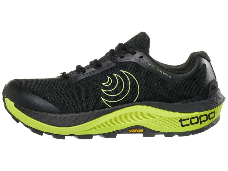 Men's Topo Athletic Mtn Racer 3. Black upper. Green/yellow midsole. Lateral view