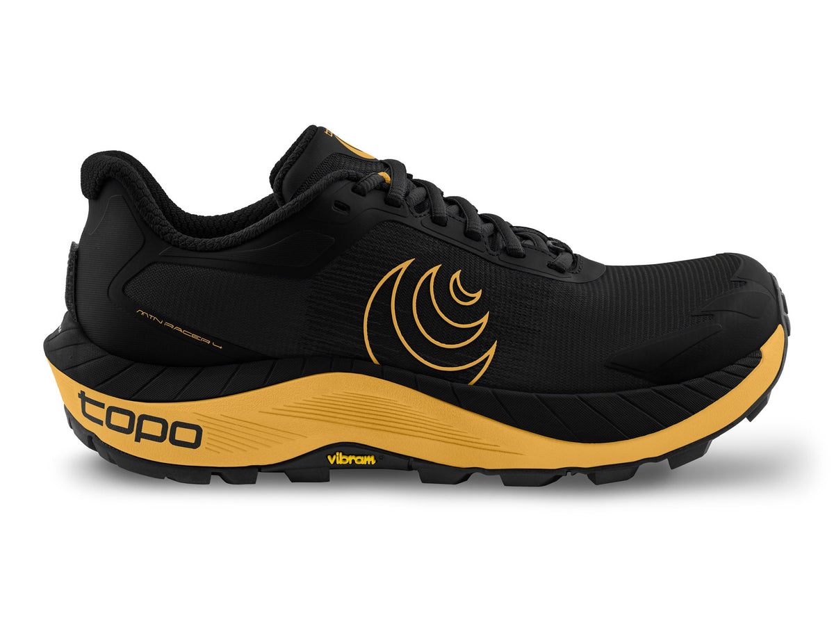 Men's Topo MTN Racer 4. Black upper. Yellow midsole. Lateral view.