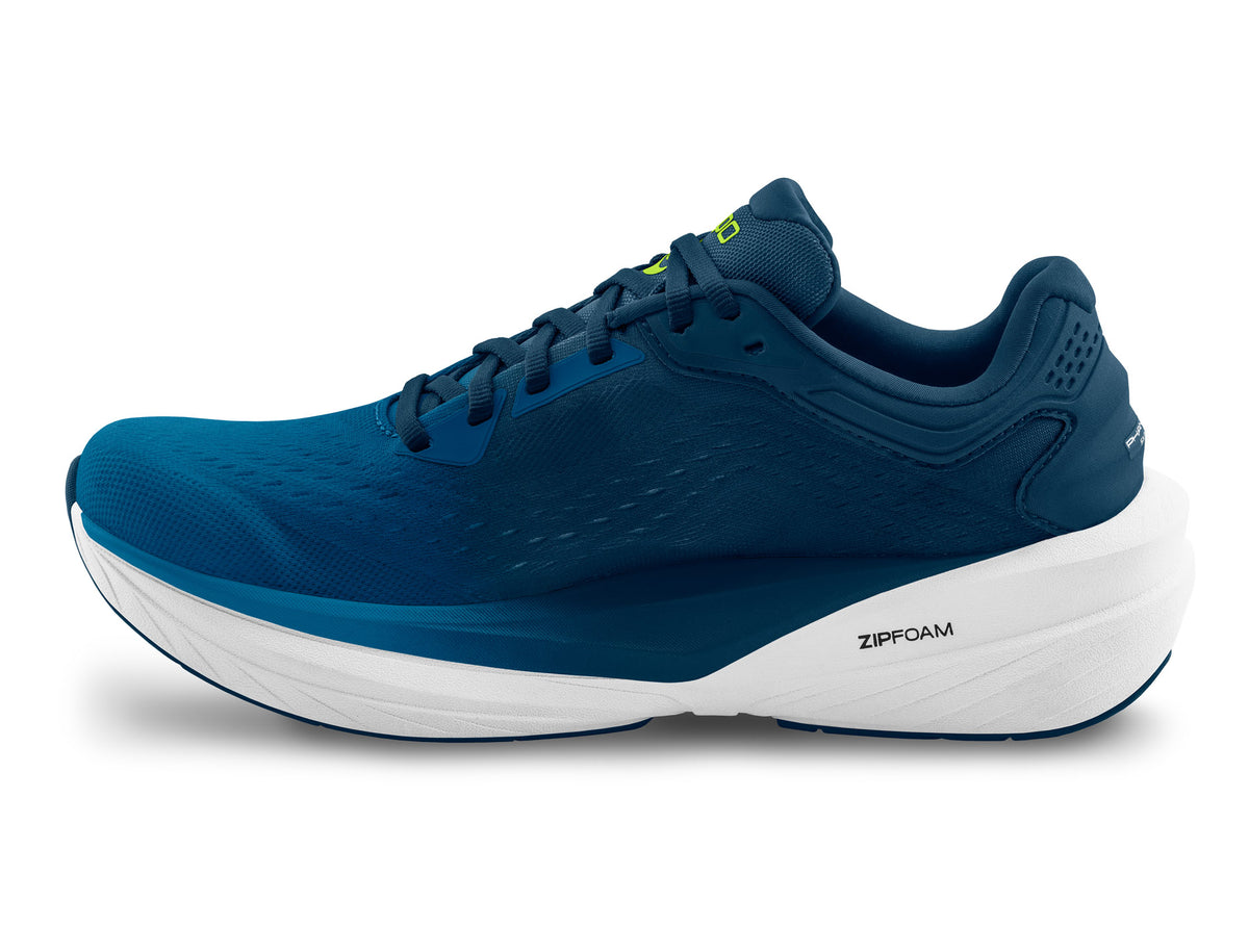 Men's Topo Phantom 4. Blue upper. White midsole. Medial view.
