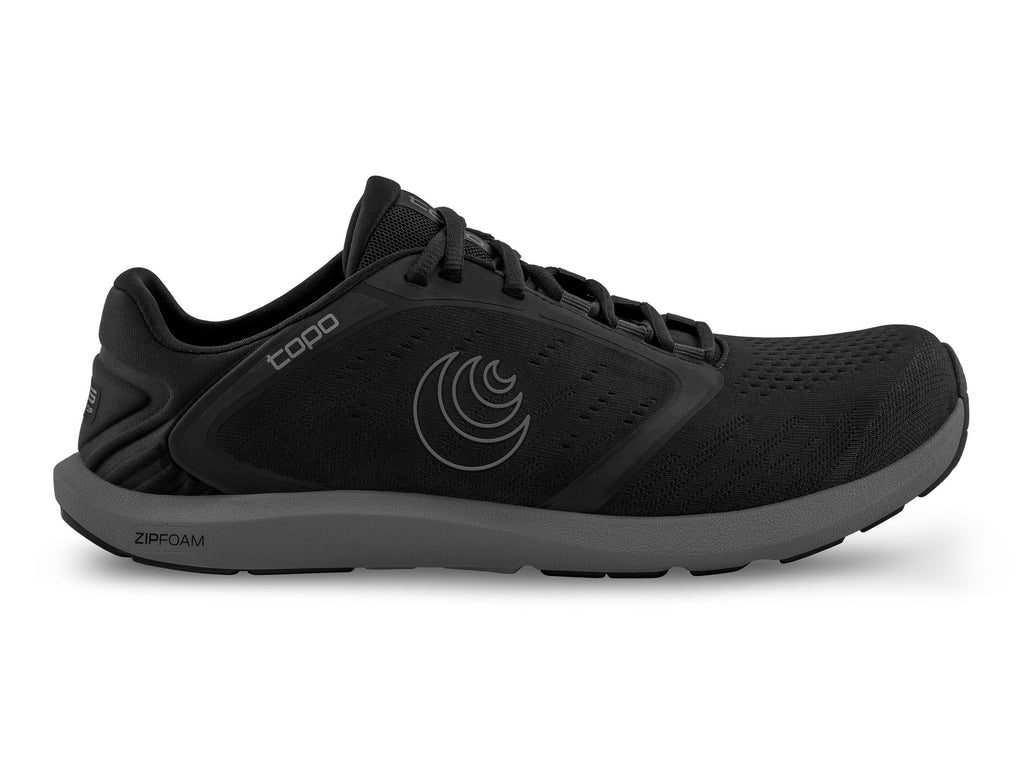 Men's Topo Athletic ST-5. Black upper. Dark grey midsole. Lateral view.