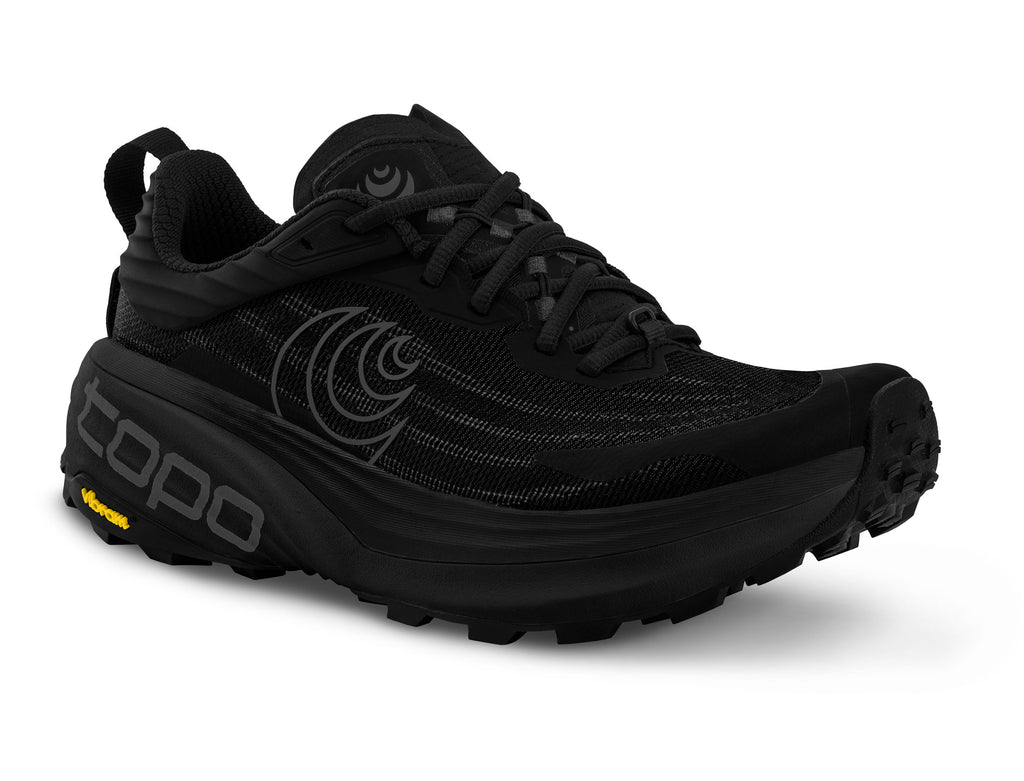Men's Topo Vista. Black upper. Black midsole. Lateral view.