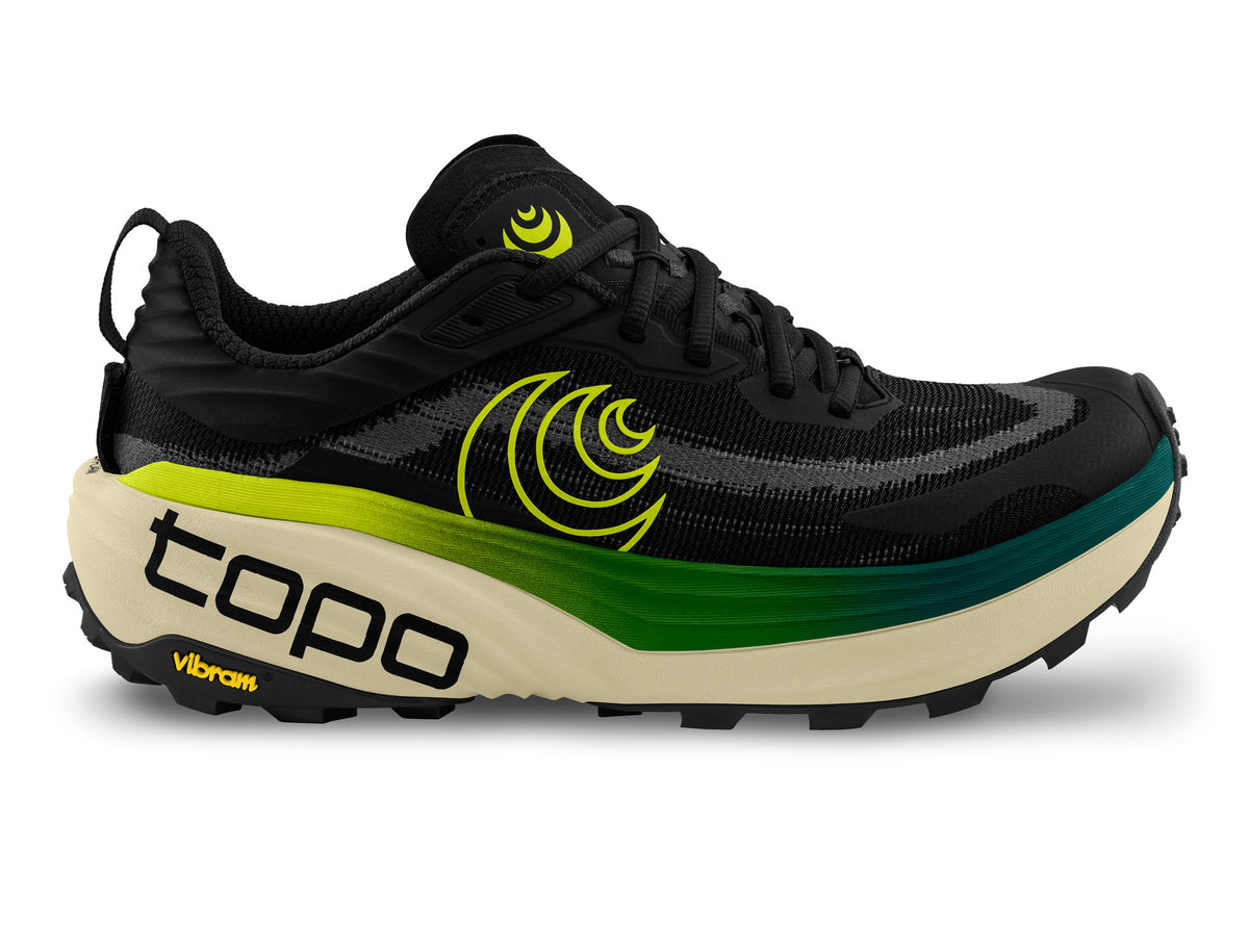 Men's Topo Vista. Black upper. Tan midsole. Lateral view.