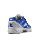 Men's Tyrol Drive V. Blue upper. Grey midsole. Rear/Lateral view.