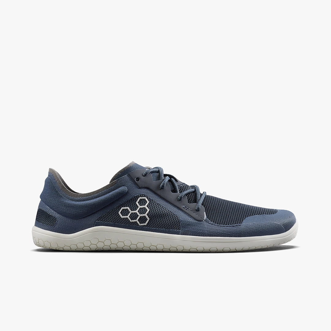 Men's Viviobarefoot Primus Lite 3.5. Navy blue upper. White midsole. Lateral view.