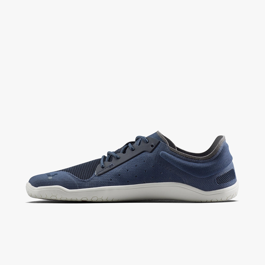 Men's Viviobarefoot Primus Lite 3.5. Navy blue upper. White midsole. Medial view.