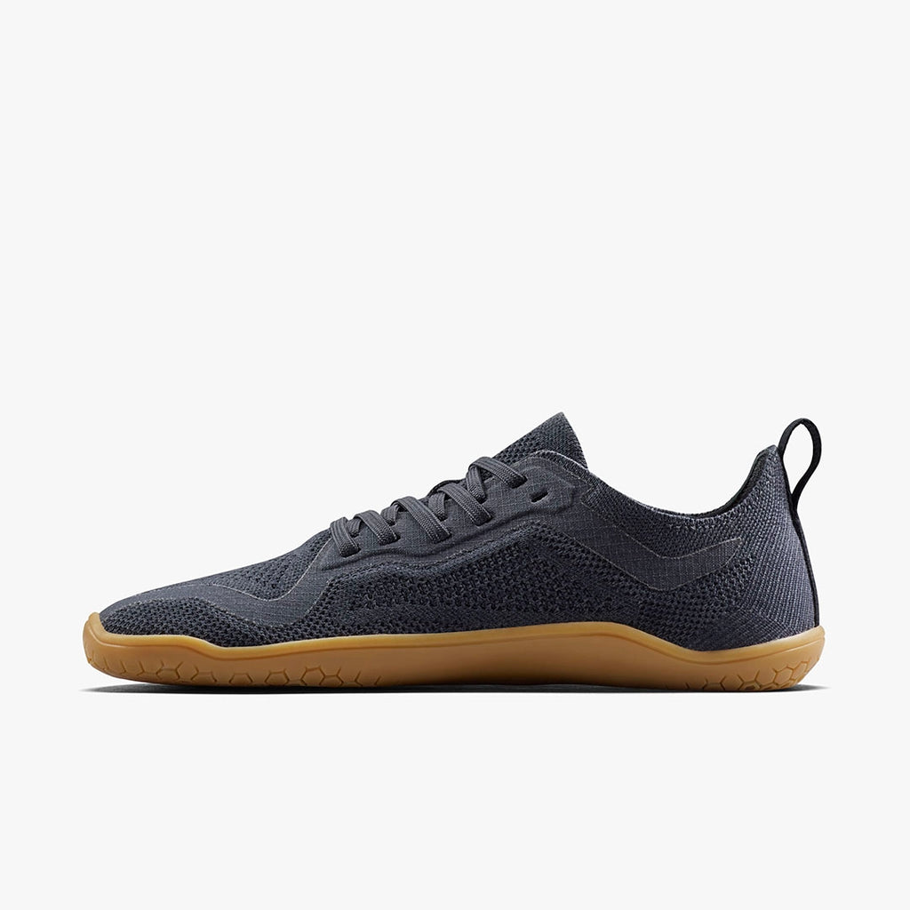 Men's Vivobarefoot Primus Lite Knit Natural. Dark grey upper. Tan midsole. Medial view.