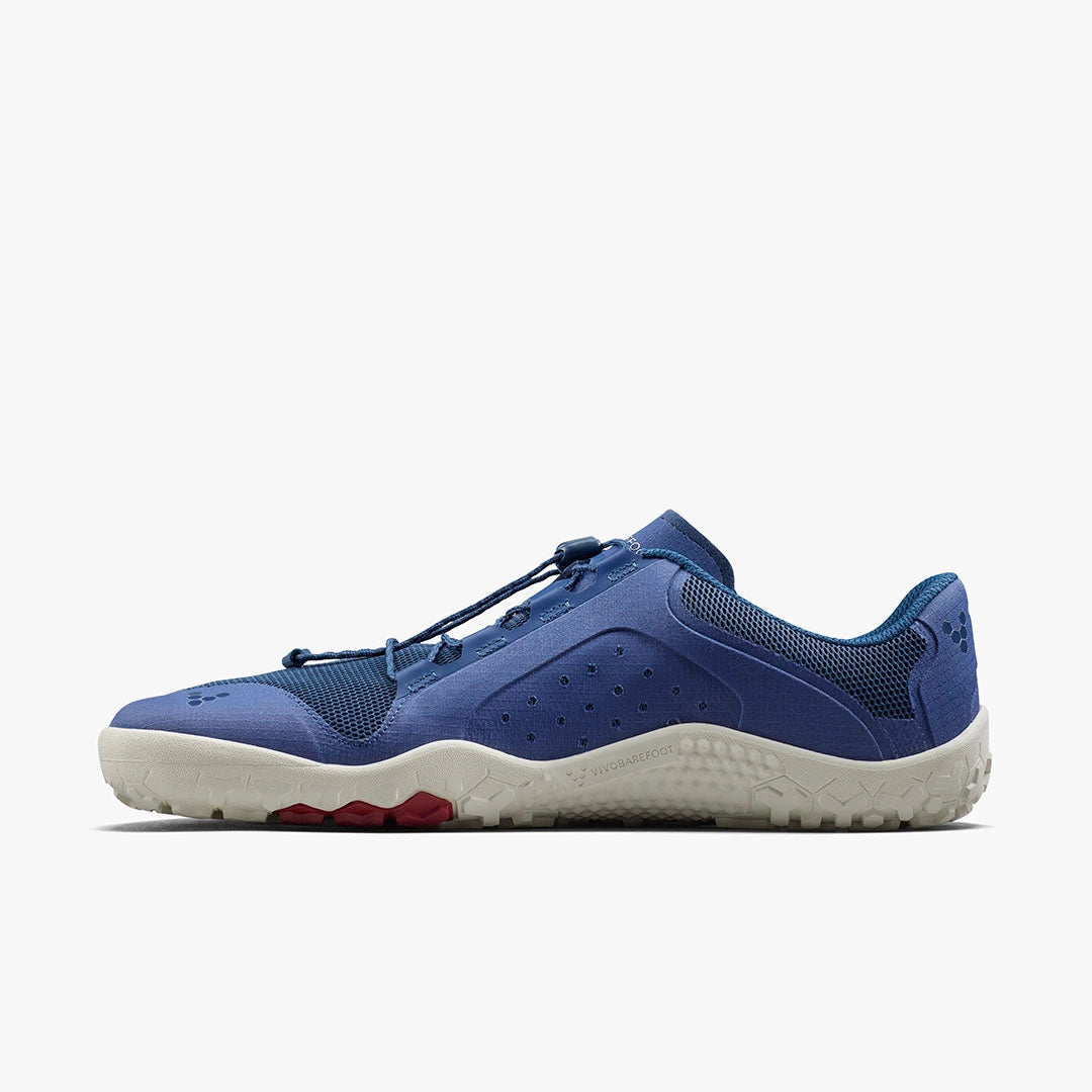 Men's Vivobarefoot Primus Trail FG 3.5. Blue upper. White midsole. Medial view.