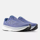 New Balance 1080 v15 men's running shoe in Fairweather Blue/Silver Metallic/Magic Blue — angled view