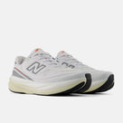 New Balance 1080 v15 men's running shoe in White/Neo Flame — angled view