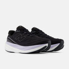 New Balance 1080 v15 women's running shoe in Black/Smoked Violet — angled view