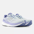New Balance 1080 v15 women's running shoe in Glint Blue/Silver Metallic/Fairweather Blue — angled view