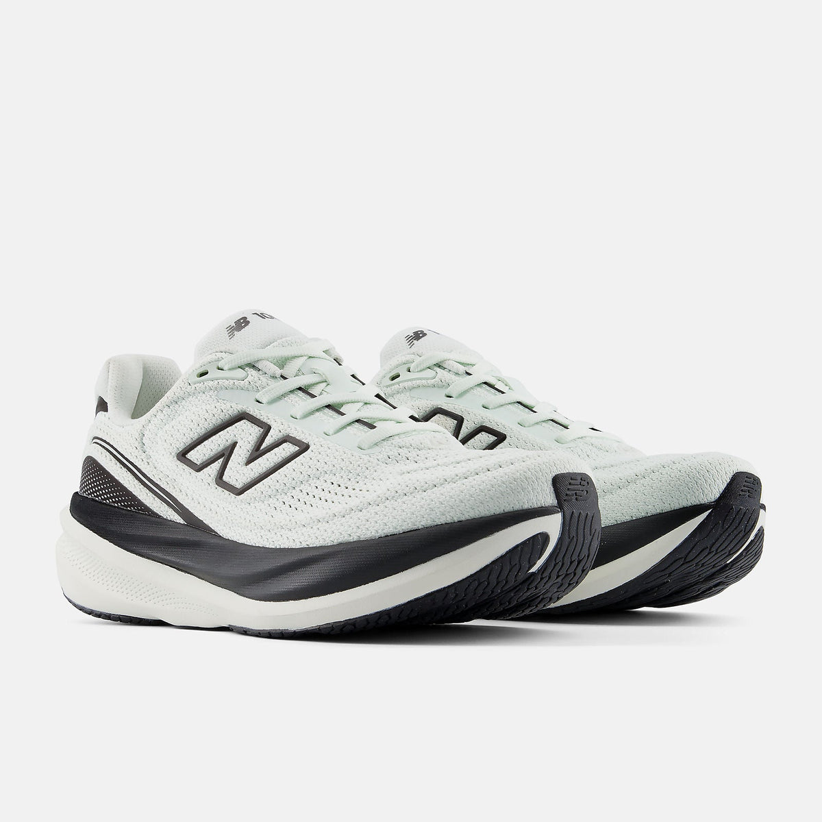 New Balance 1080 v15 women's running shoe in Mint Water/Black Metallic — angled view