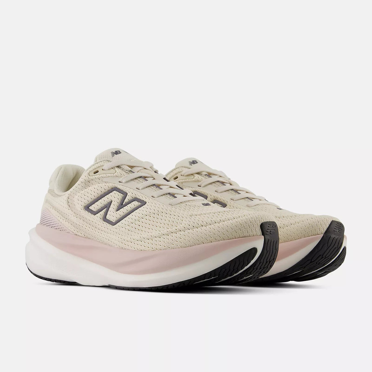 New Balance 1080 v15 women's running shoe in Timberwolf/Neptune Grey — angled view