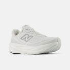 New Balance 1080 v15 women's running shoe in White/Silver Metallic — angled view
