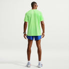 Men's Nike Stride Aero-Fit Short Sleeve Running Shirt in Volt/Light Silver, rear view.