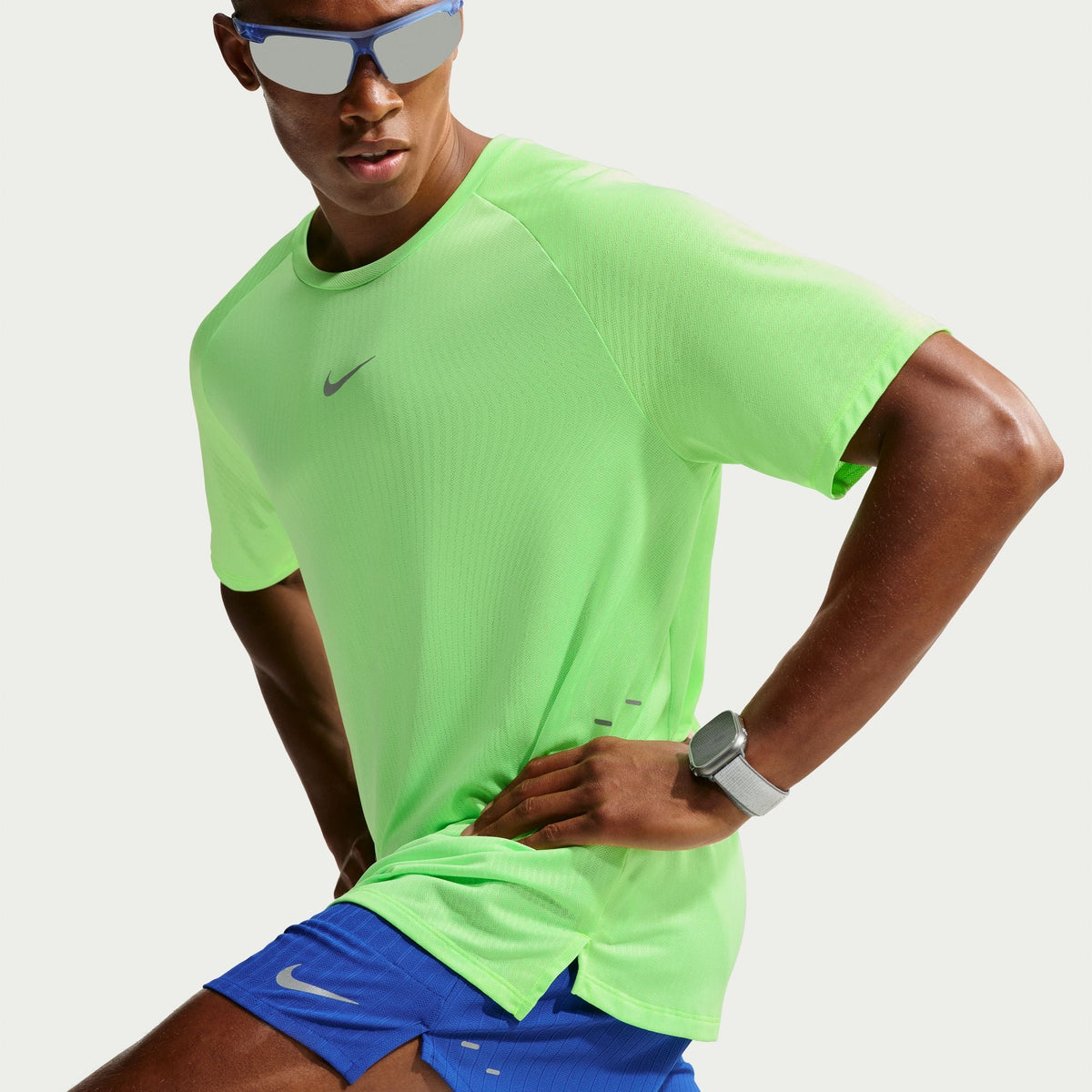 Men's Nike Stride Aero-Fit Short Sleeve Running Shirt in Volt/Light Silver, performance detail.
