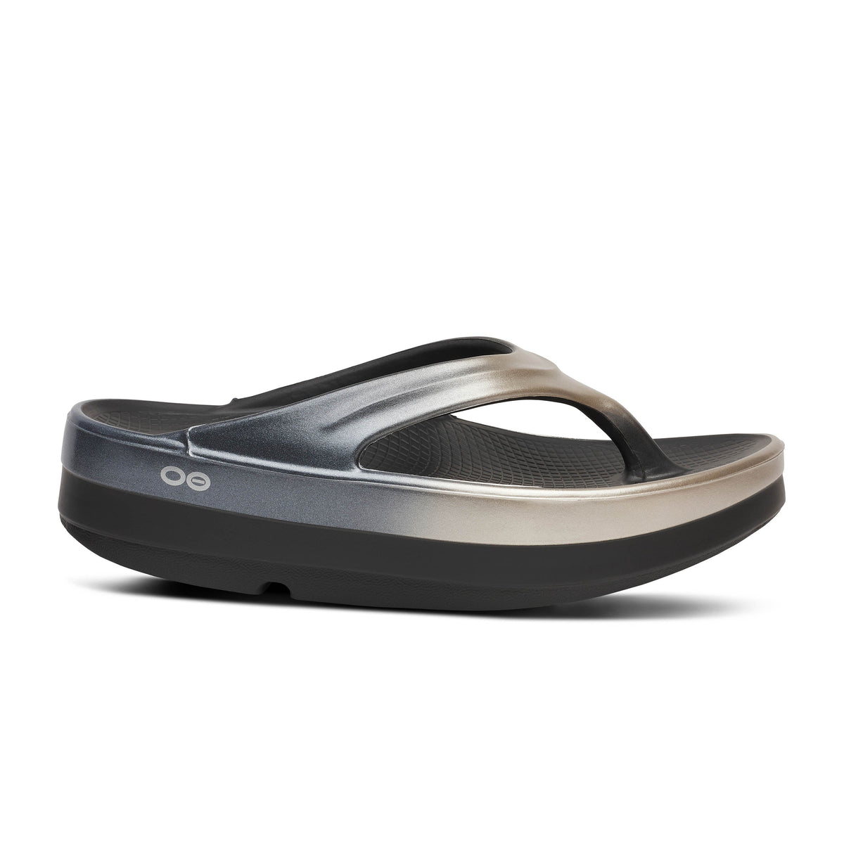 Women's OOFOS OOmega OOlala Luxe Sandal in Latte Fade. Gold and black. Lateral view.