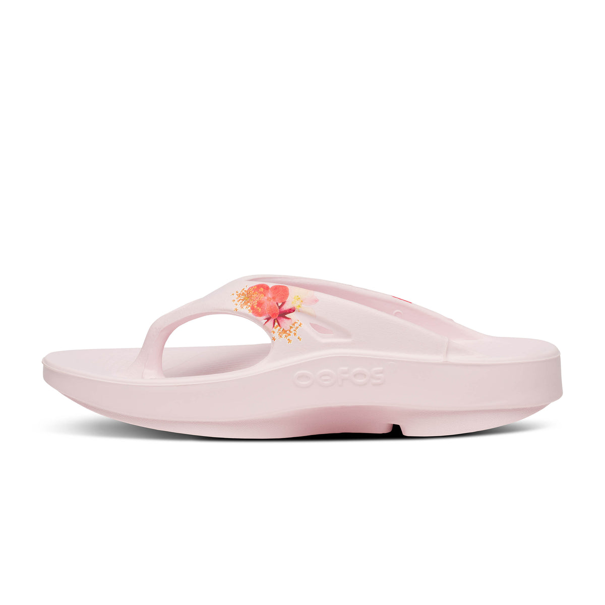 Oofos Ooriginal Limited Thong. Pink colorway with floral pattern. Medial view.