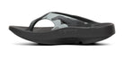 OOFOS OOriginal Sport Sandal in Night Camo. Camo upper and black midsole. Medial view.