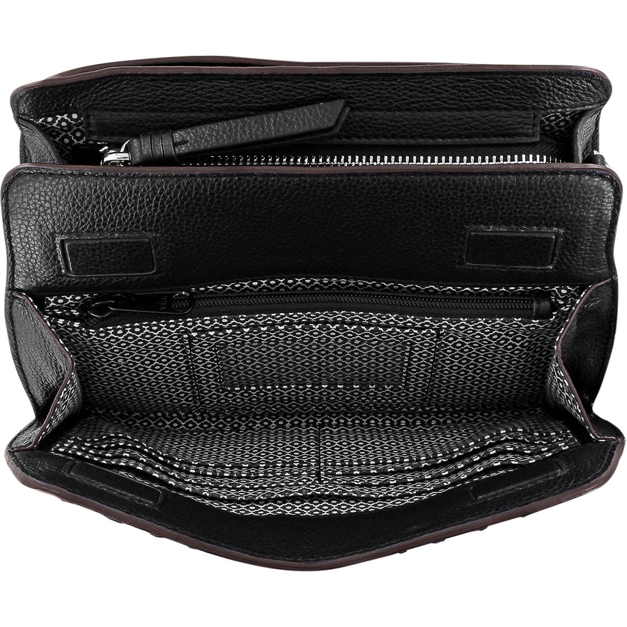 Black leather bag with zippers on a white background