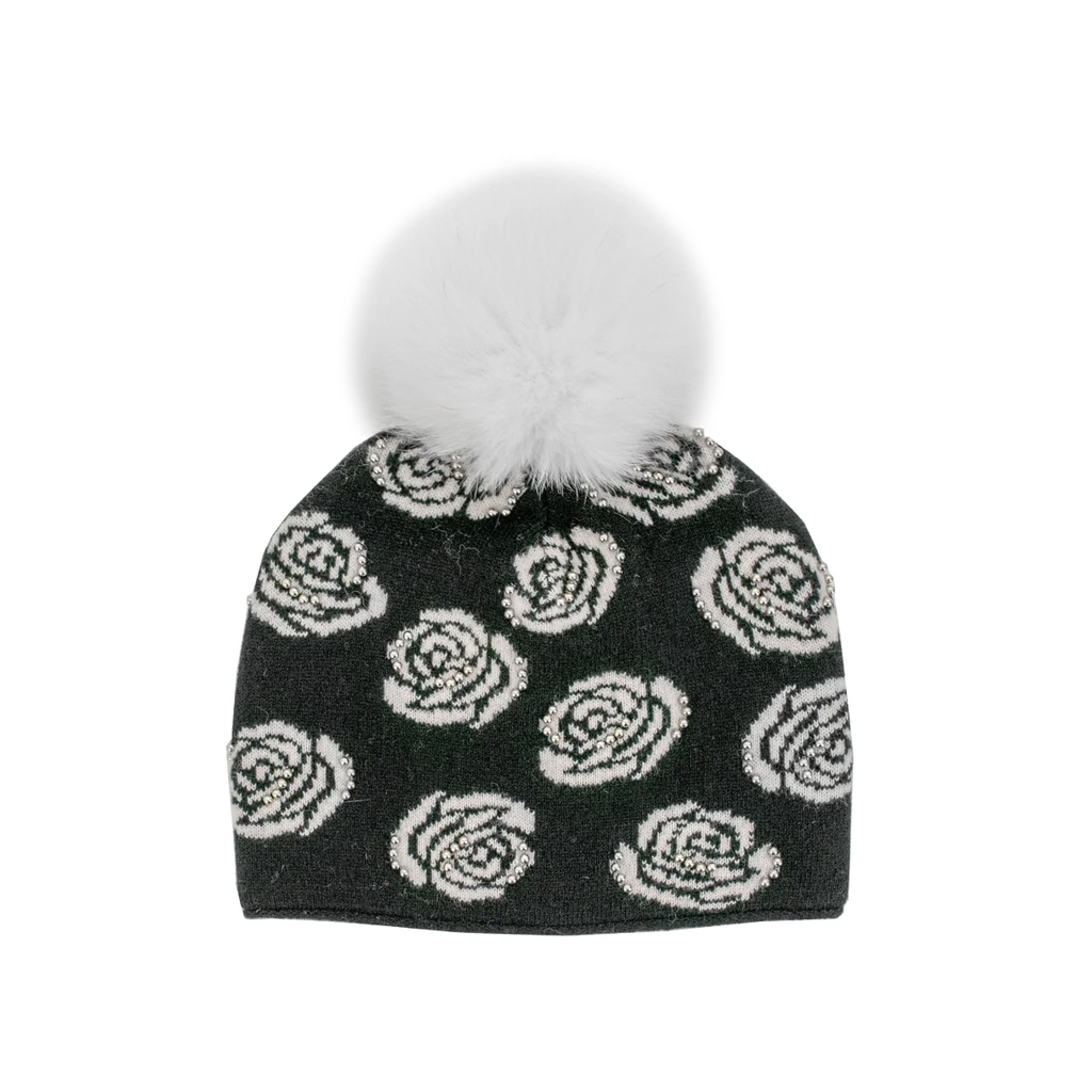 black hat with white roses and white fur pom