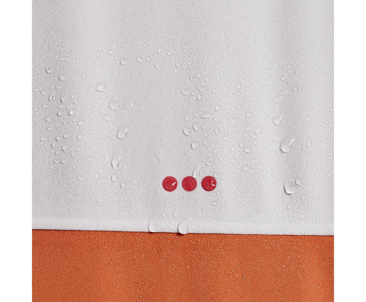 Women's Saucony Boulder Drizzle Jacket. Orange/White. Closeup.