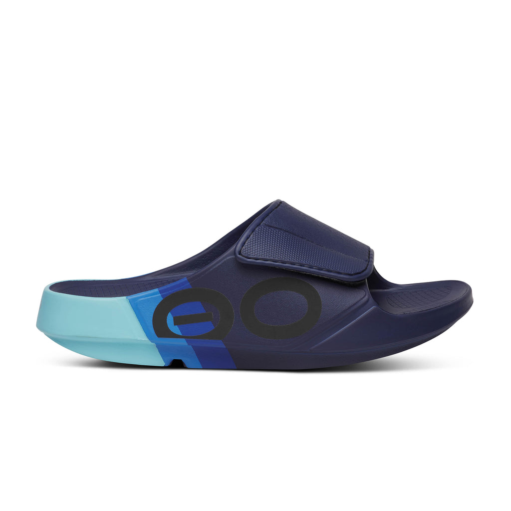 Unisex Oofos Ooahh Sport Flex Sandal. Blue. Lateral view.