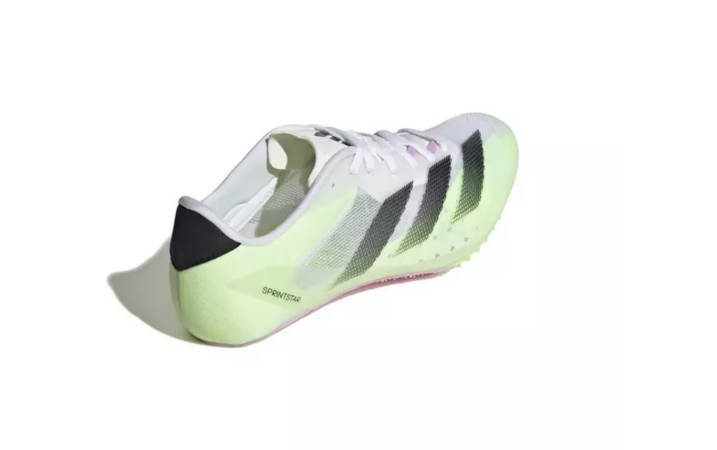 Unisex Adidas Sprintstar. White, black, and green upper. Lateral view.