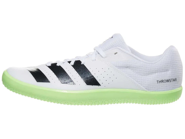 white sneaker with black stripes and green bottom. lateral view.