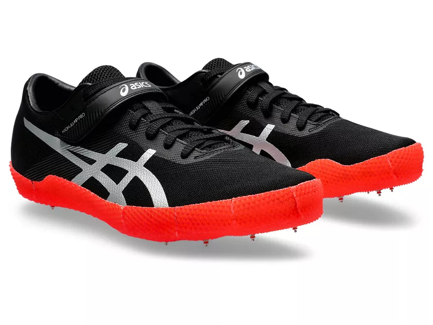 Unisex Asics High Jump Pro Right. Black upper. Red midsole. Lateral view.