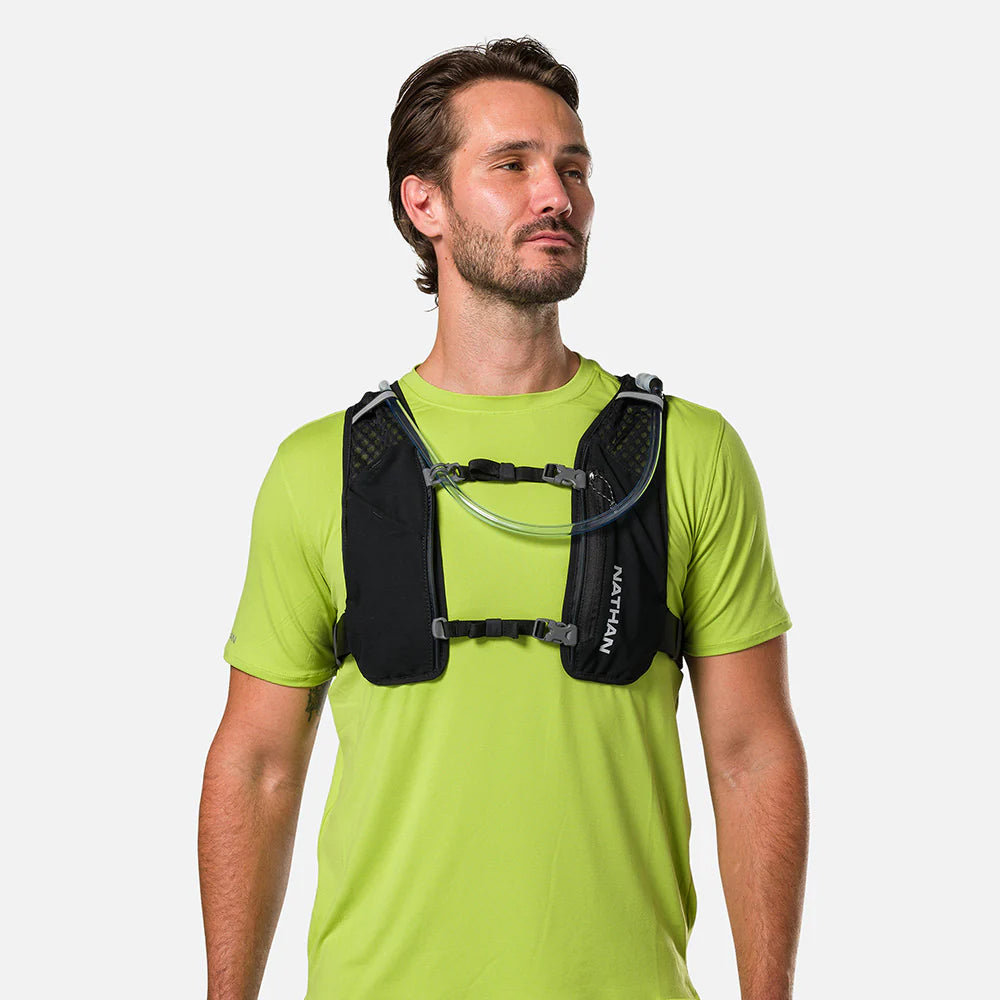 Unisex Nathan Quickstart 3.0 4 Liter Hydration Pack. Black. Front view.