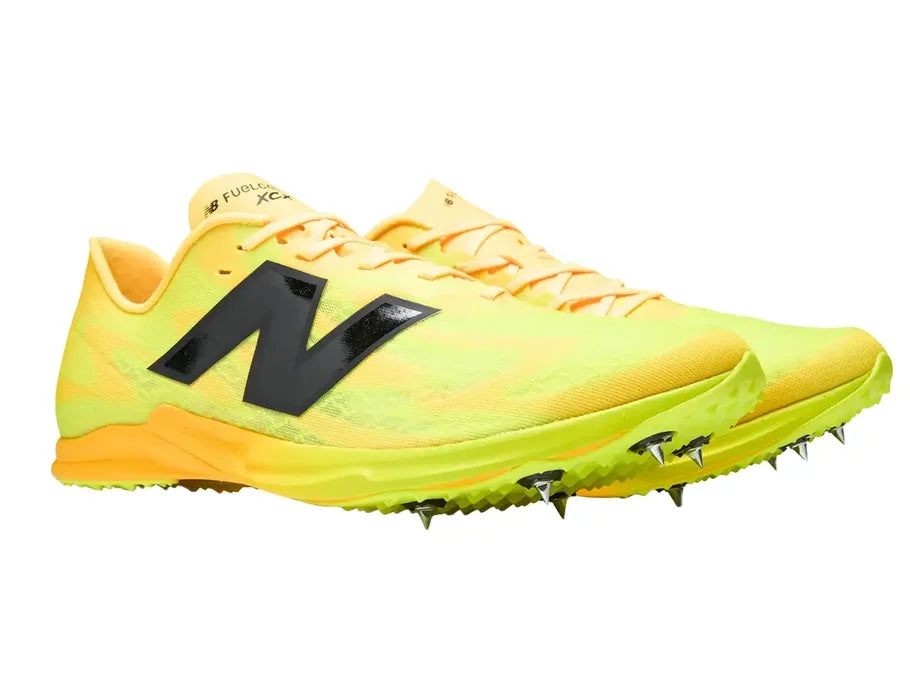 New Balance FuelCell XC-X. Yellow upper. Orange midsole. Lateral view.