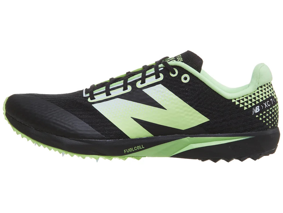 Unisex New Balance FuelCell XC7 v5. Black upper. Black midsole. Lateral view.