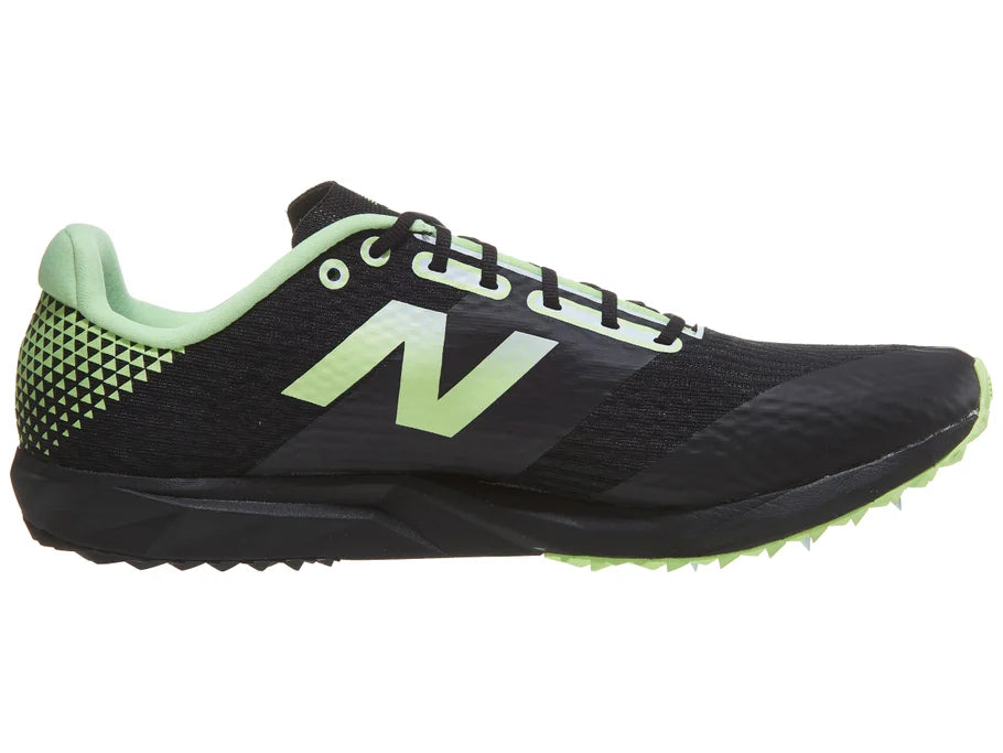 Unisex New Balance FuelCell XC7 v5. Black upper. Black midsole. Medial view.