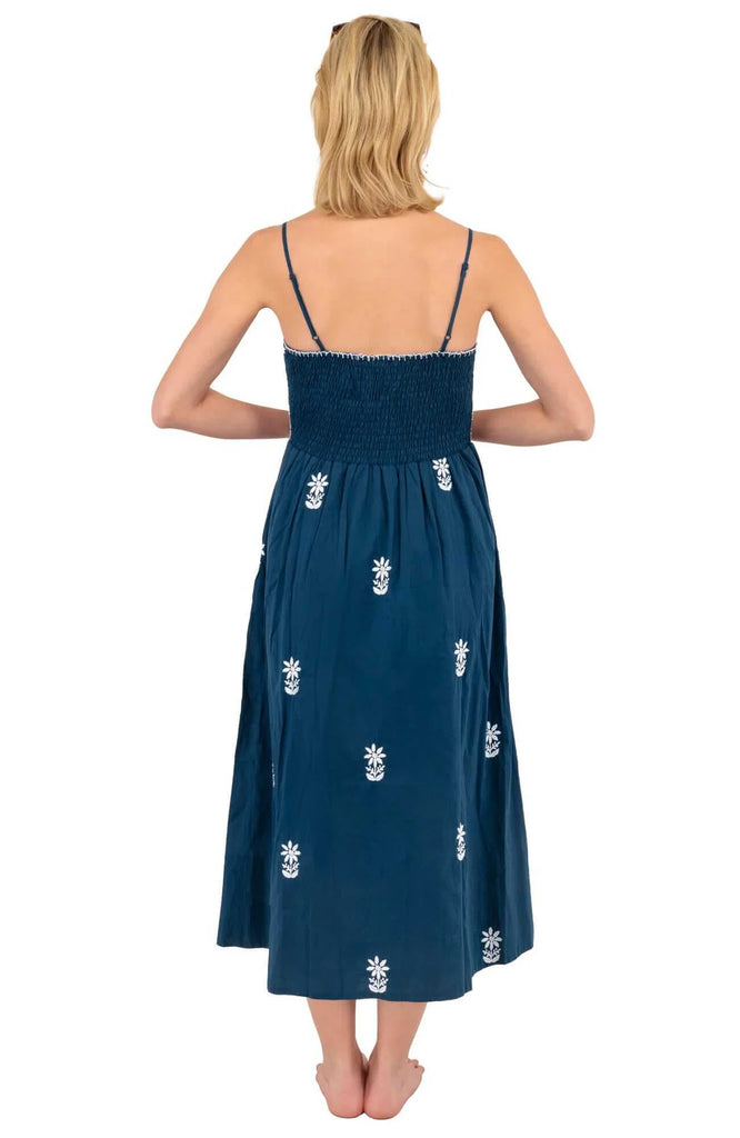 Women's Gretchen Scott Hand Embroidered Midi Dress. Blue with white pattern. Back view.