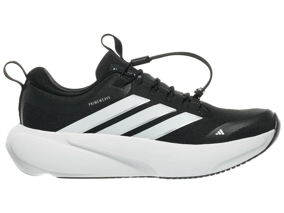 Women's Adidas Supernova Adaptive. Black upper. White midsole. Medial view.