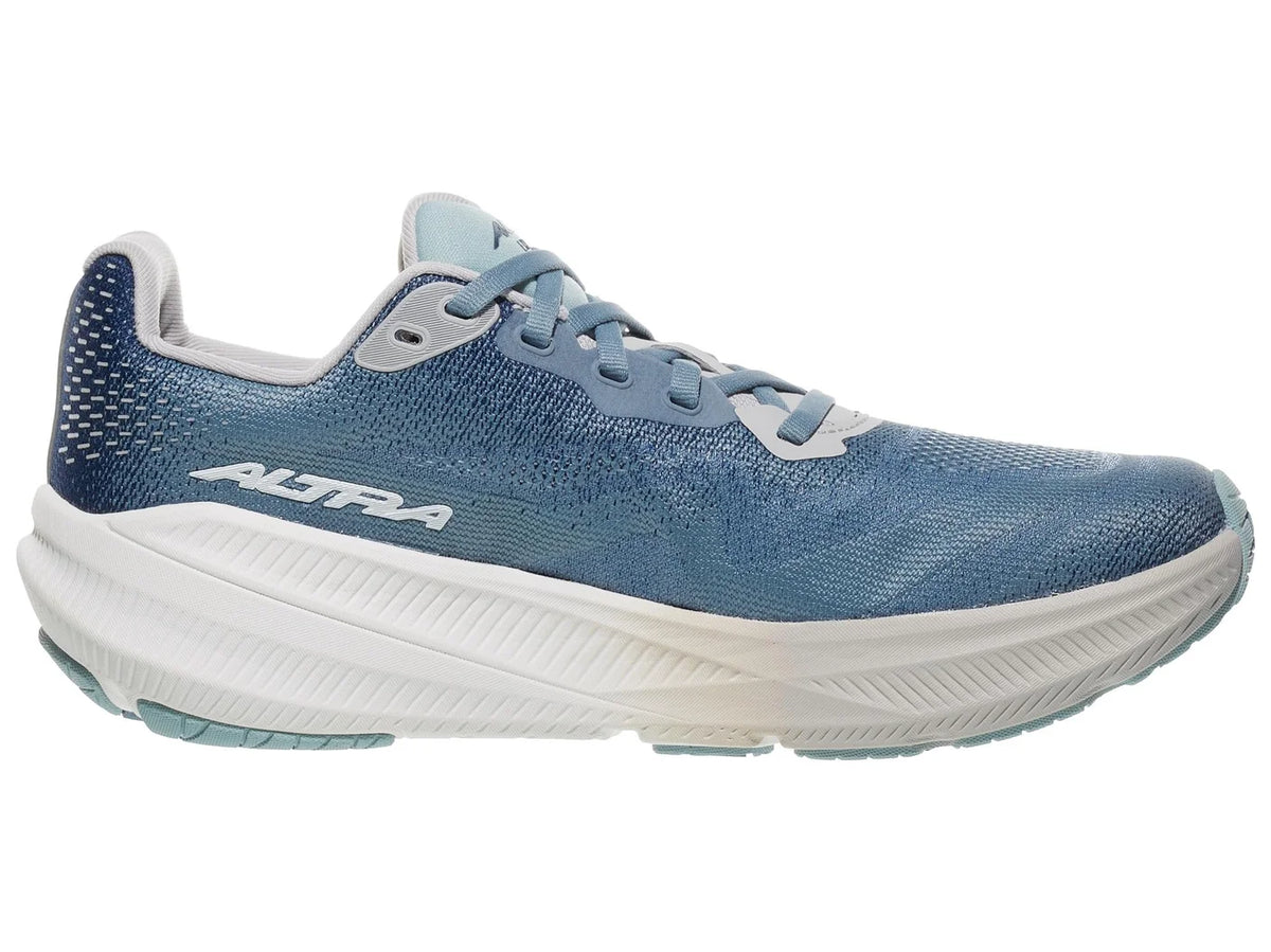 Women's Altra Experience Flow 3. Blue upper. White midsole. Medial view.