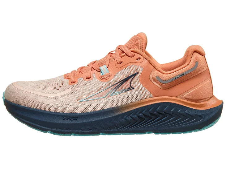 Women's Altra Paradigm 7. Light pink upper. Navy midsole. Lateral view.