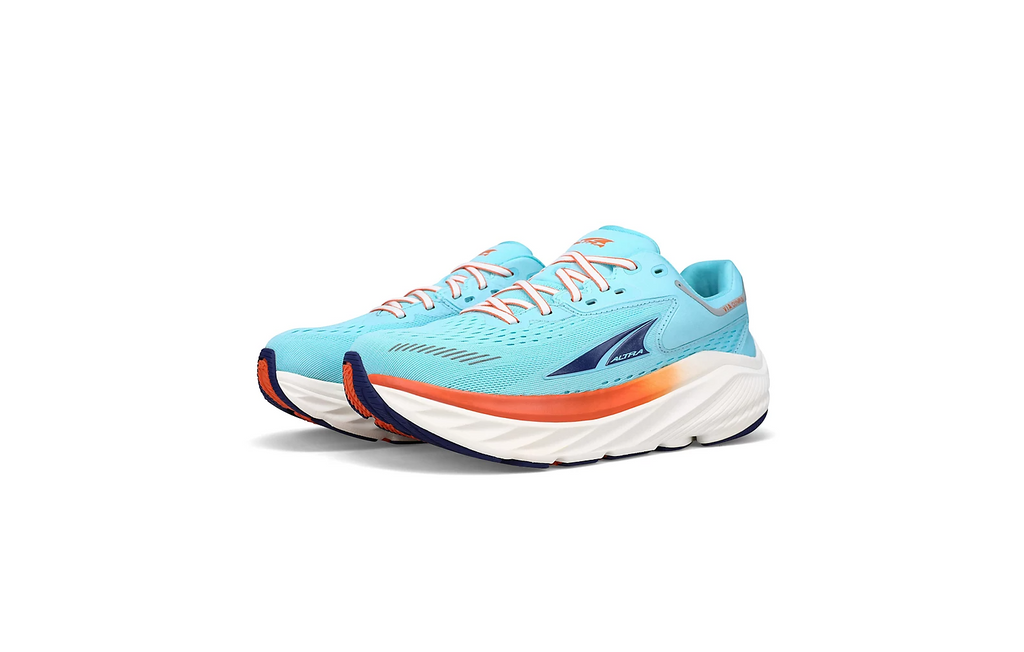 Women's Altra Via Olympus. Light blue upper. White midsole. Lateral view.