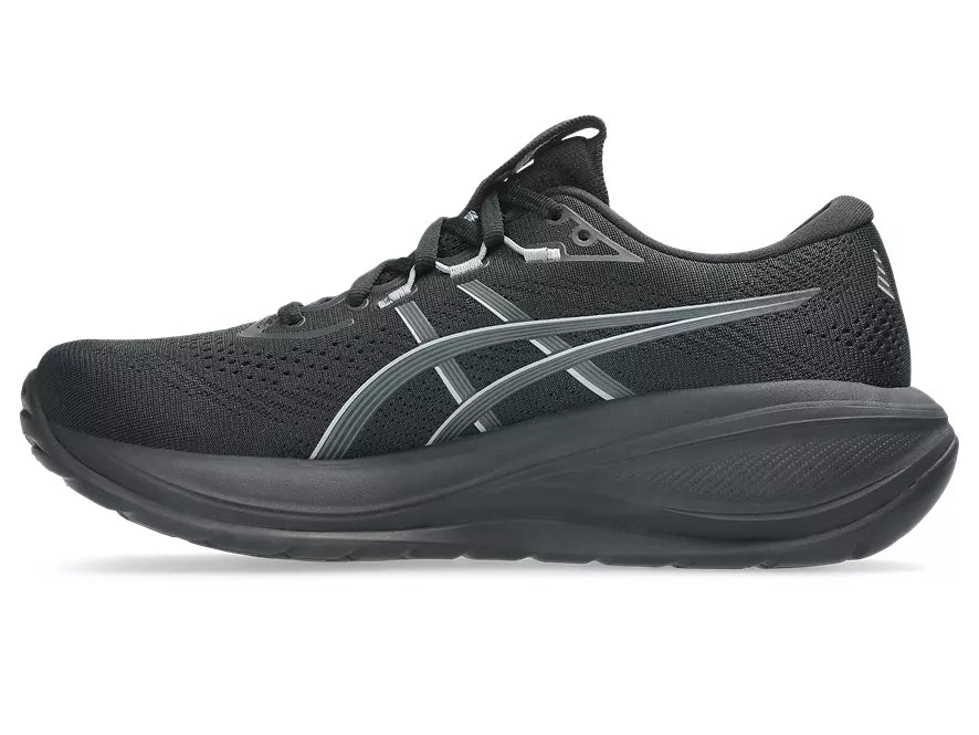 Women's Asics Gel-Cumulus 28. Black upper. Black midsole. Medial view.
