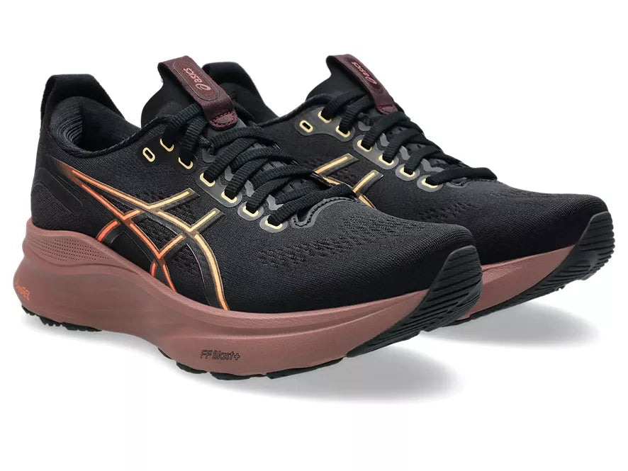 Women's Asics Gel Kayano 32. Black upper. Dark Pink Midsole. Lateral view.