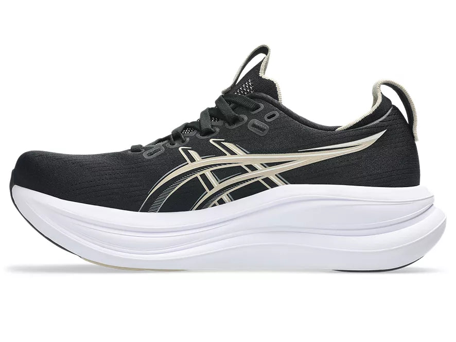 Women's Asics Gel-Nimbus 2. Black upper. White midsole. Medial view.