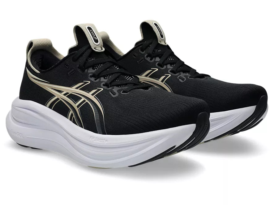 Women's Asics Gel-Nimbus 2. Black upper. White midsole. Lateral view.