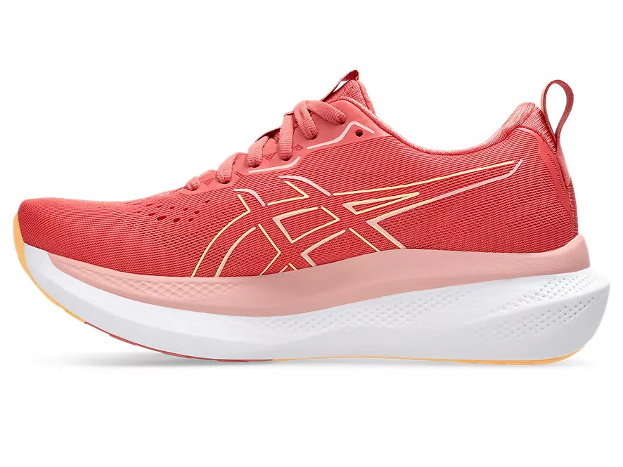 Women's Asics GlideRide Max. Red upper. White midsole. Medial view.