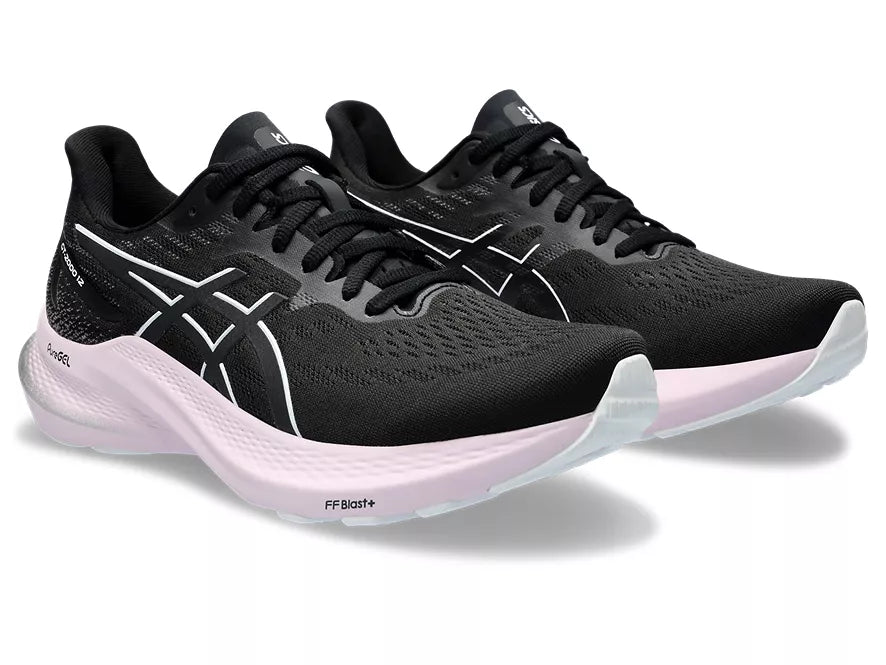 Women's Asics GT 2000 12. Black upper. White midsole. Lateral view.