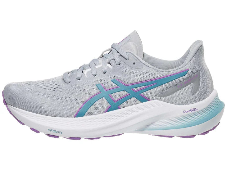 Women's Asics GT-2000 12. Light Grey upper. White midsole. Lateral view.