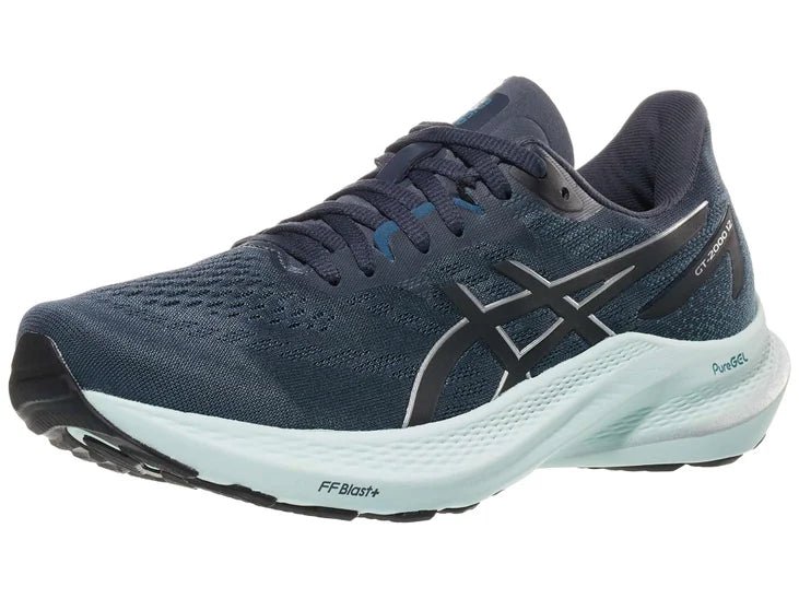 Women's Asics GT-2000 12. Grey upper. White midsole. Lateral view.