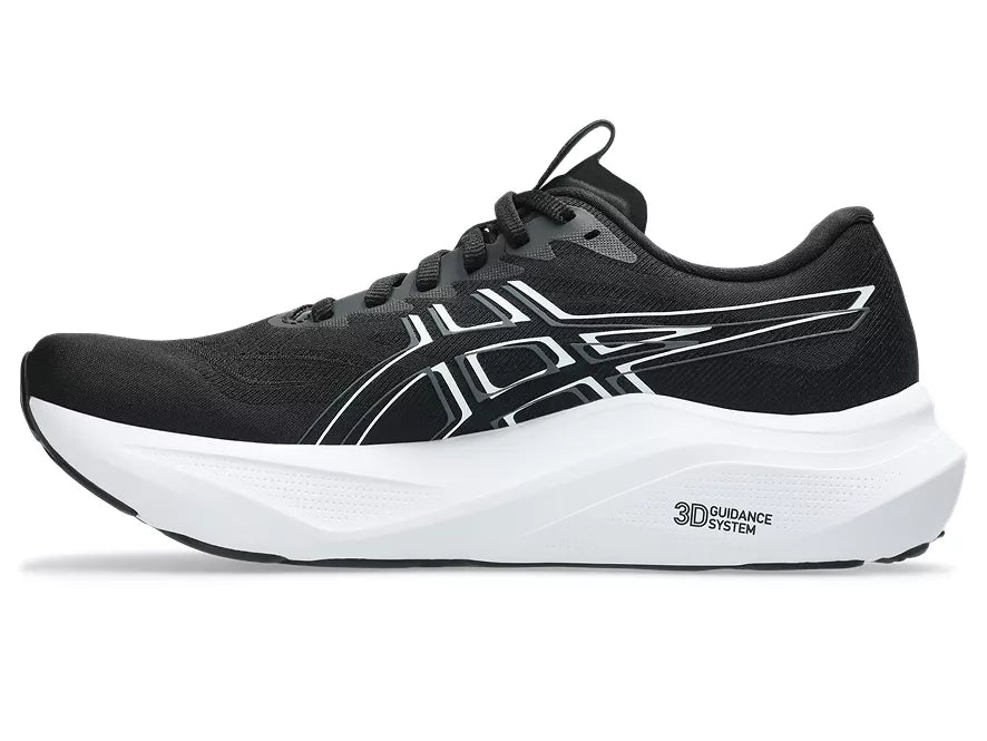 Women's Asics GT-2000 14. Black upper. White midsole. Medial view.