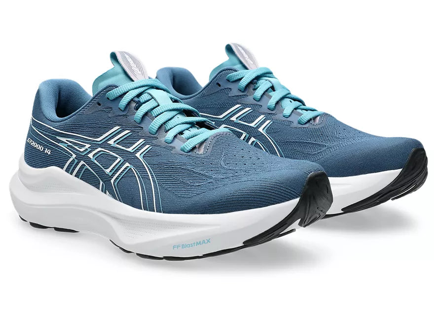 Women's Asics GT 2000 14. Dark Teal upper. White midsole. Lateral view.