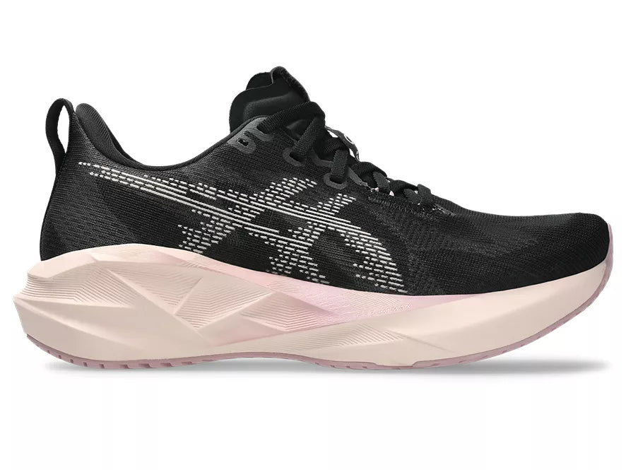 Women's Asics Novablast 5. Black upper. White midsole. Lateral view.